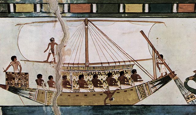 An ancient tablet showing an Egyptian riverboat with a sail