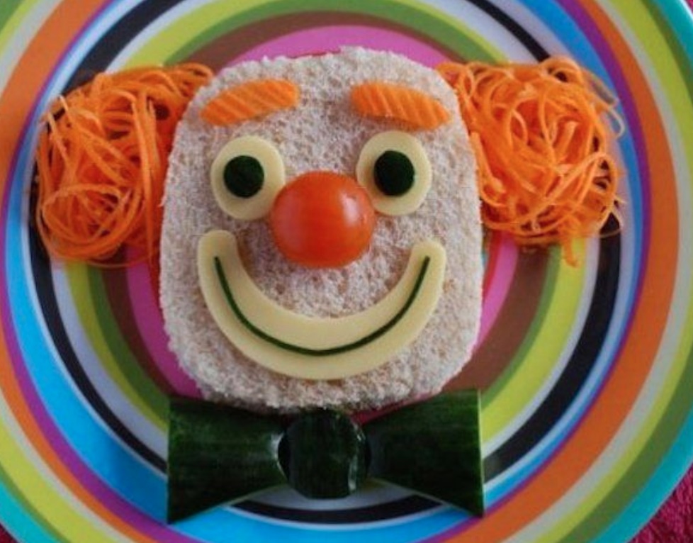 Name: Georgianna. Higly commended. FUSSY EATERS. Munching into an omega-3 filled tuna grained sandwich, whilst chomping crunchy carrot curls, the clown’s red Rudolph tomato nose illuminates. The mouth watering cucumber bow-tie compliments the dairy rich, wide-eyed and cheesy smile! No hidden veggies . . . and a heap of protein, carbohydrates and good fats! As a variety of food is key in designing a fun and appetising dish, this nutritious clown entices these little fussy eaters to gobble up their five food groups for their growing, developing and energetic bodies. Removing one or more of these food groups would decrease the nutritional value.