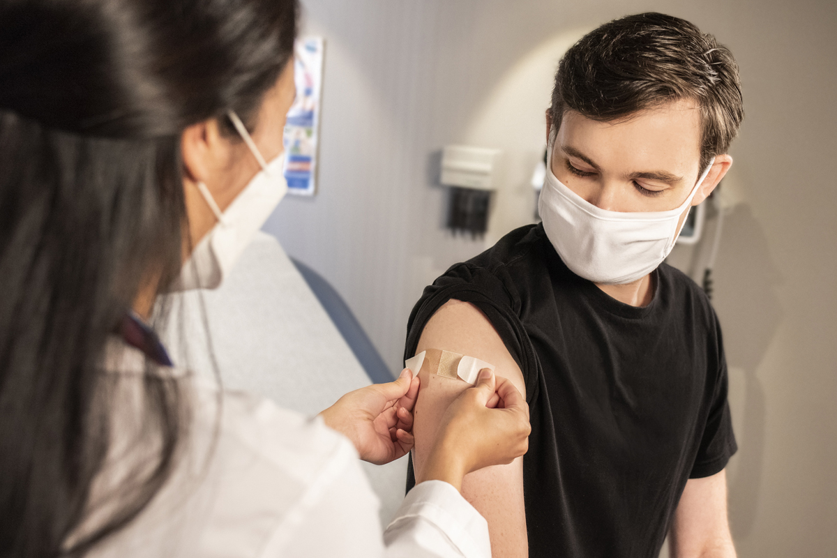 A person receiving a vaccine.