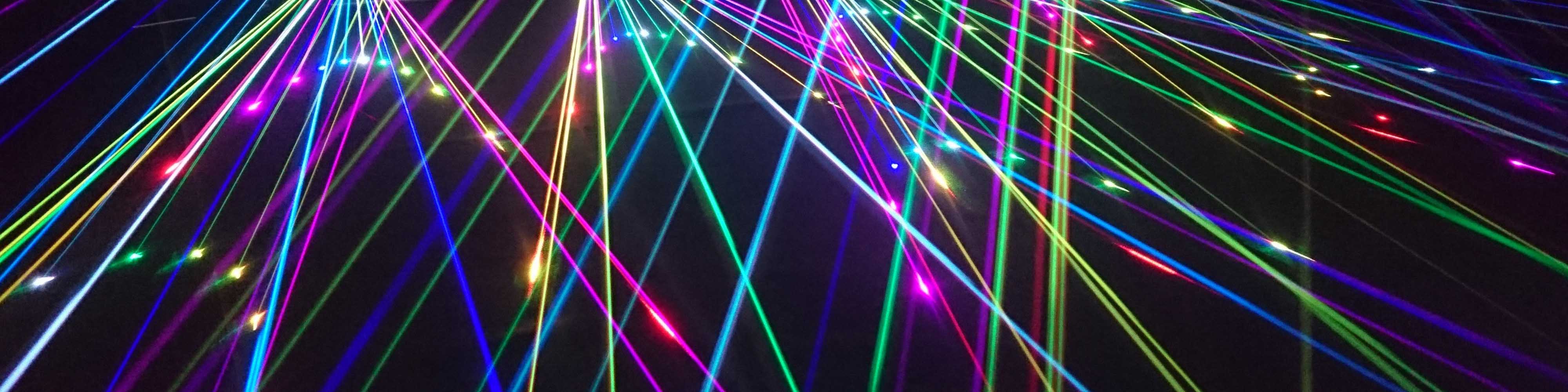 How do you focus regular light to make it a laser beam?