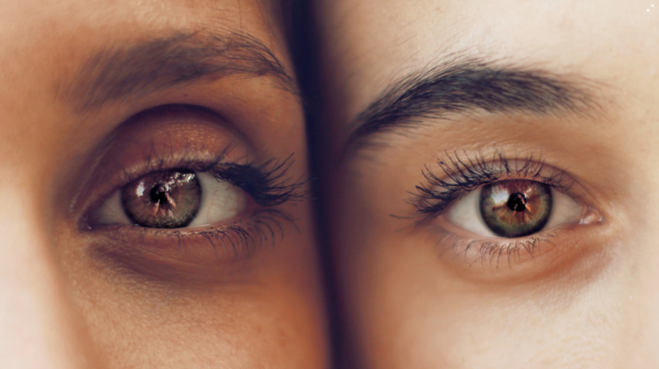 Closeup of two people looking at camera