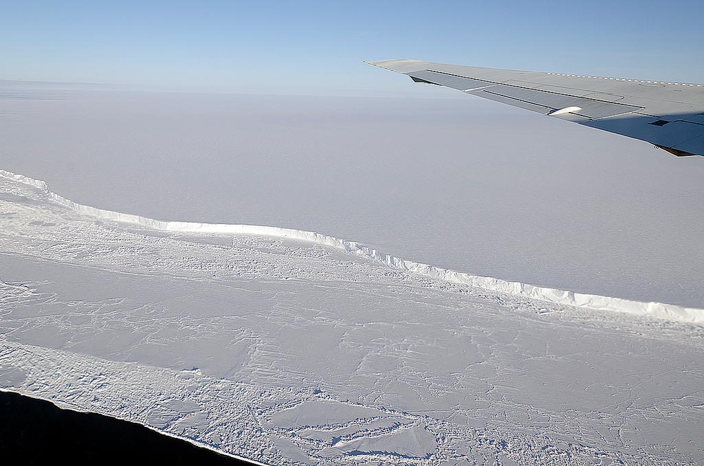 A the edge of a huge ice sheet and the ocean seen from the air