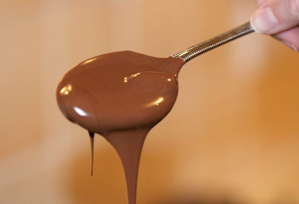 Photo of melted chocolate on a spoon