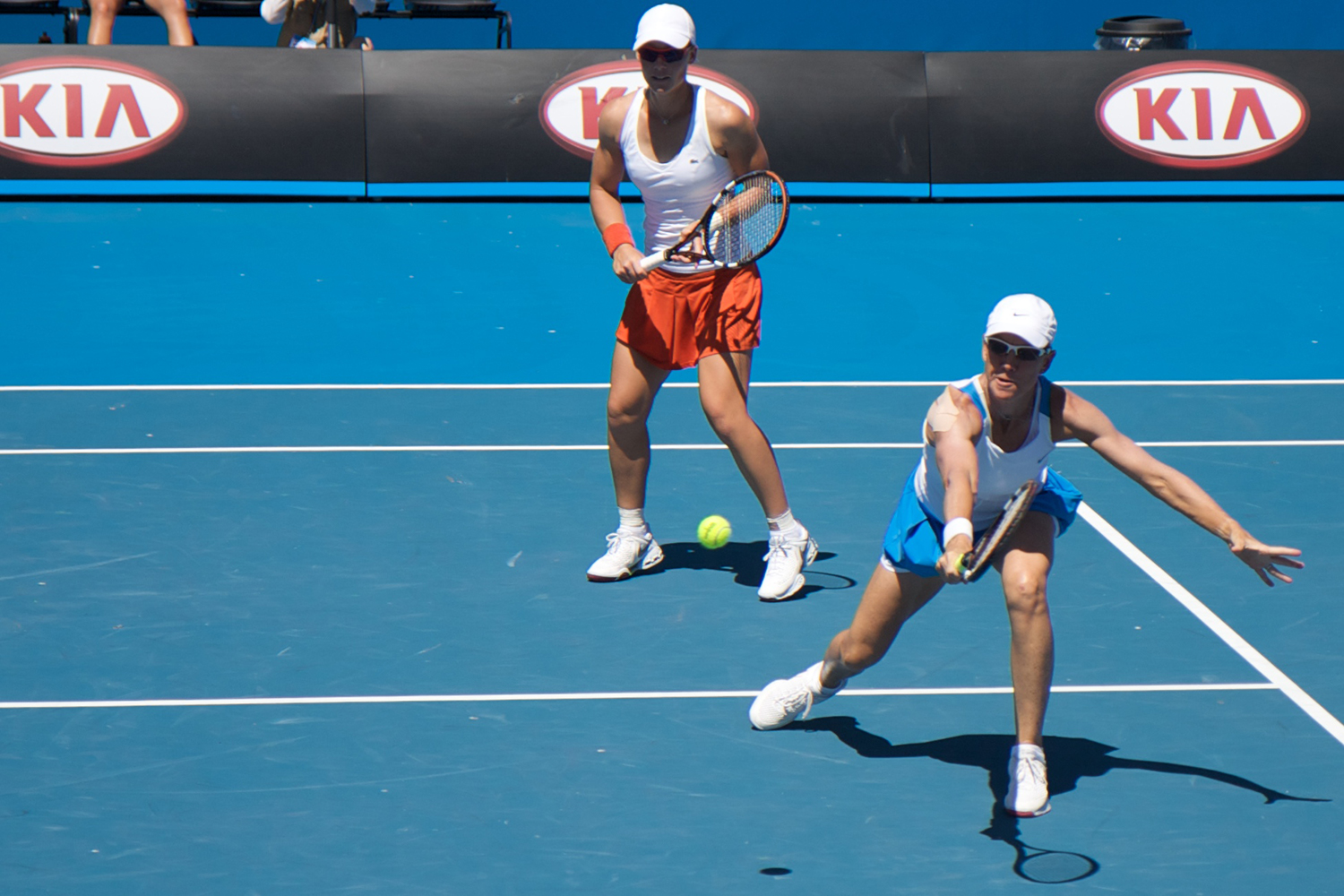 A doubles tennis team on the court