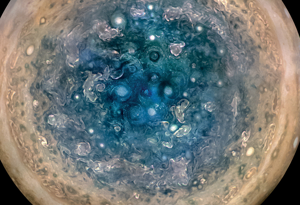 The south pole of Jupiter, coloured blue with swirls