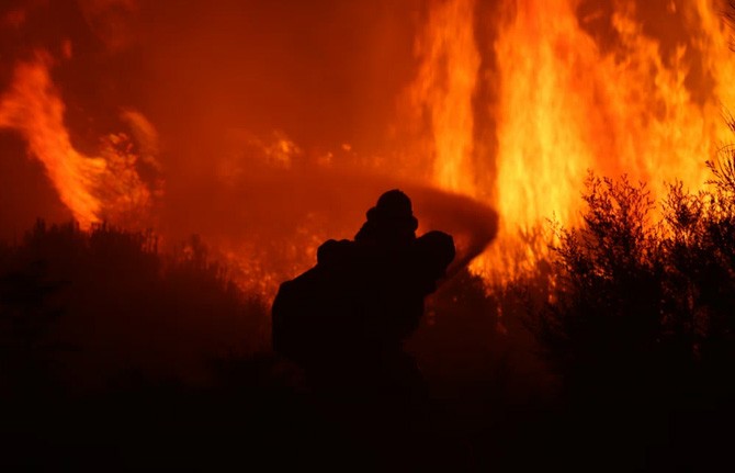 Firefighters battling a ferocious blaze.