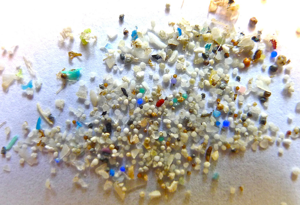 Close-up of tiny fragments of plastic