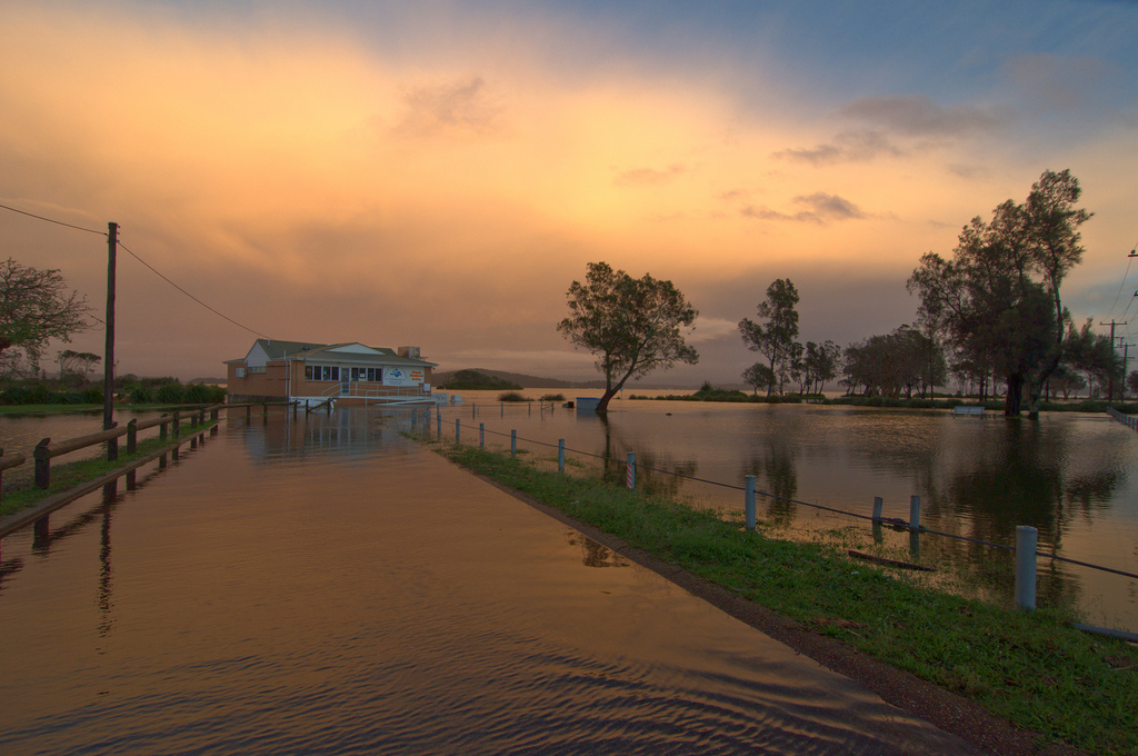 House surrounded by floodwaters