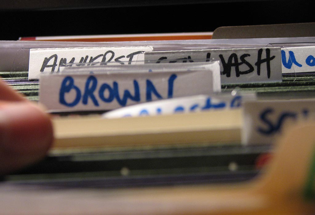Close up of labels on files in a cabinet