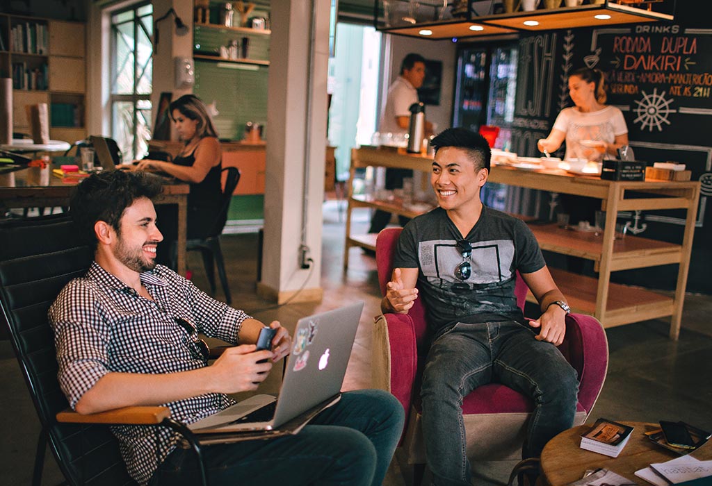 Two people chatting in a cafe