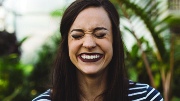 A smiling woman.