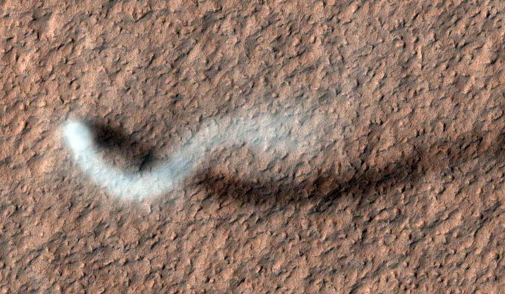 Picture of a swirling dust devil on Mars