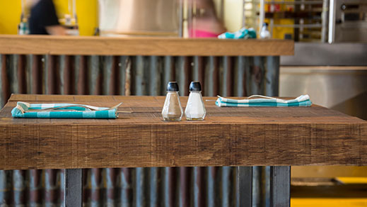 Salt shakers on a table.