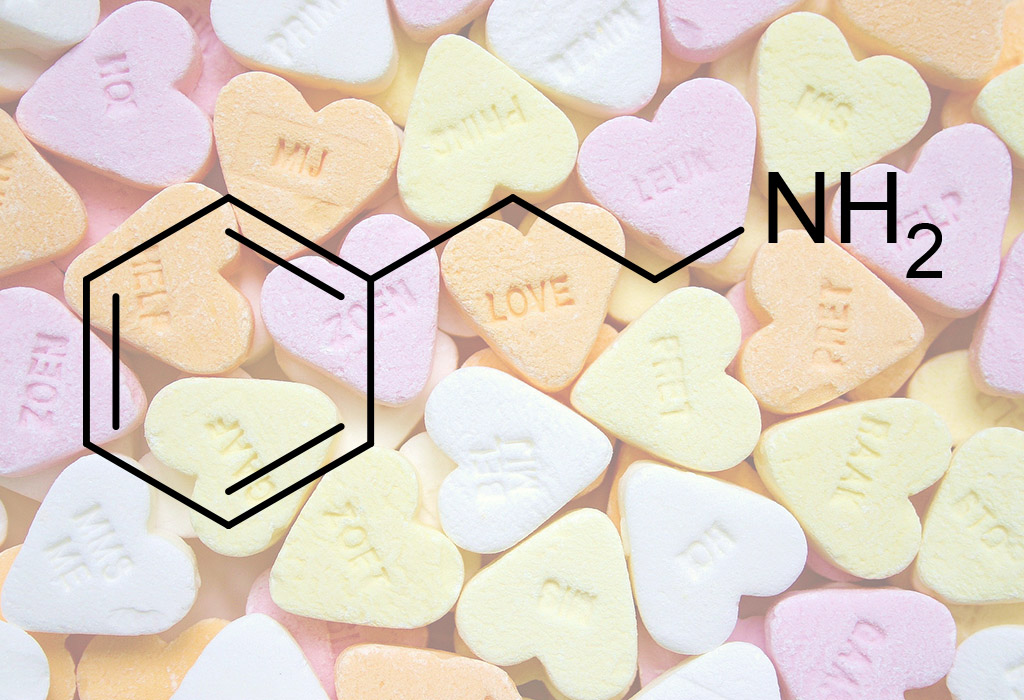 Chemical structure of phenylethylamine superimposed on heart-shaped lollies