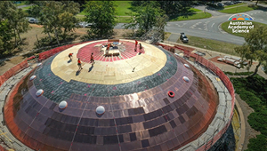 New copper tiles being installed on the Shine Dome