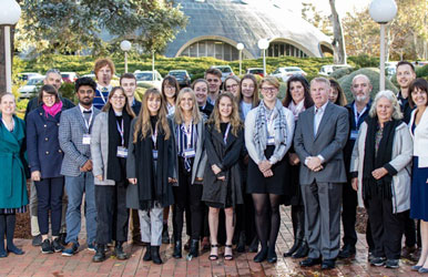 Group of senior school students with their teachers and other adults