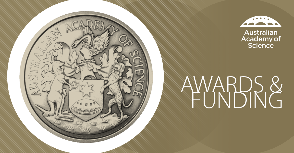 An academy medal on a gold background.